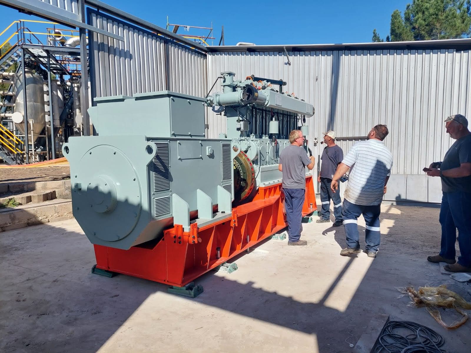 CNP engineers with a generator set on site