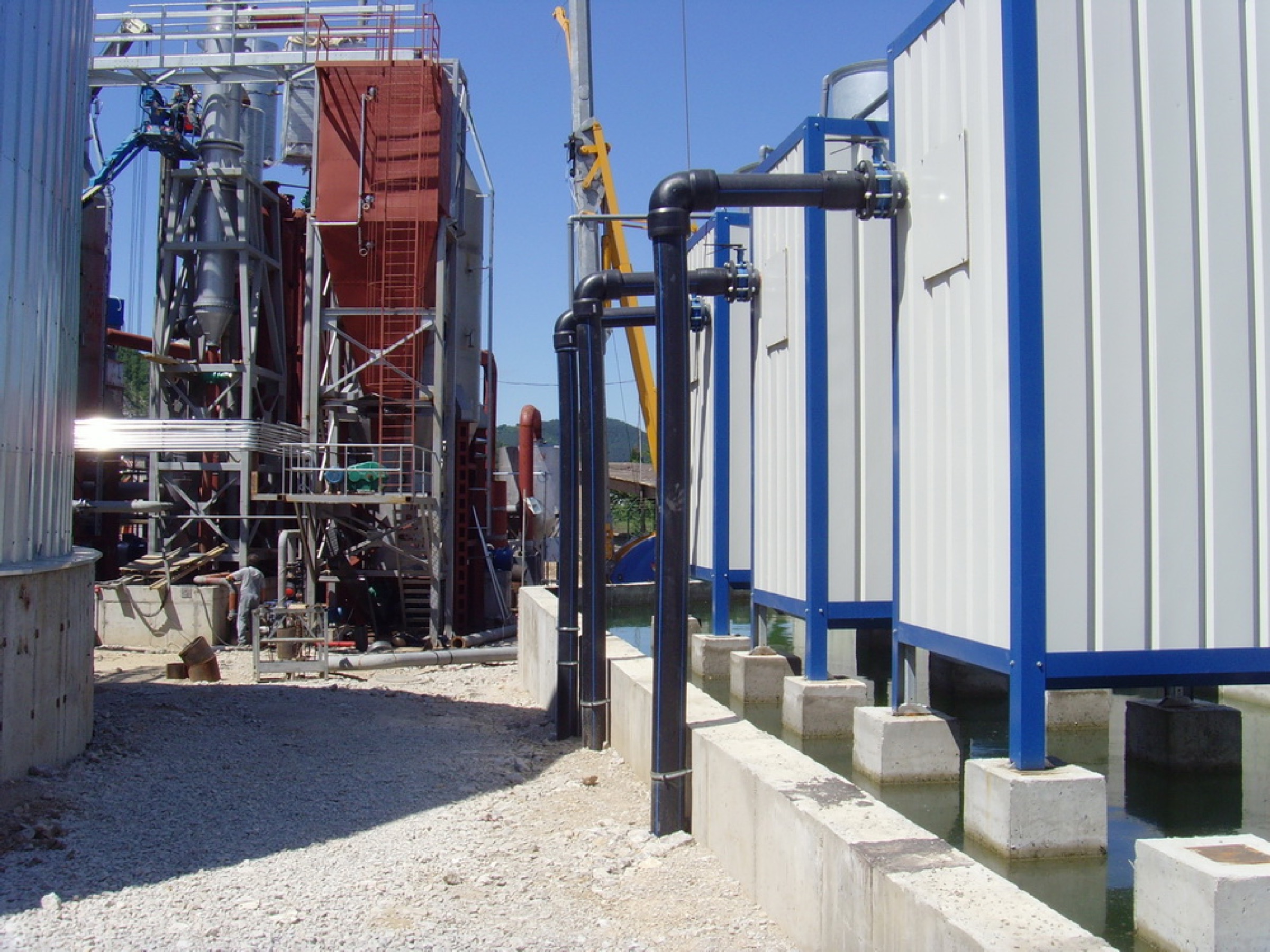 CNP biomass power project in Bulgaria under construction, with process plant beside the containerised engine units